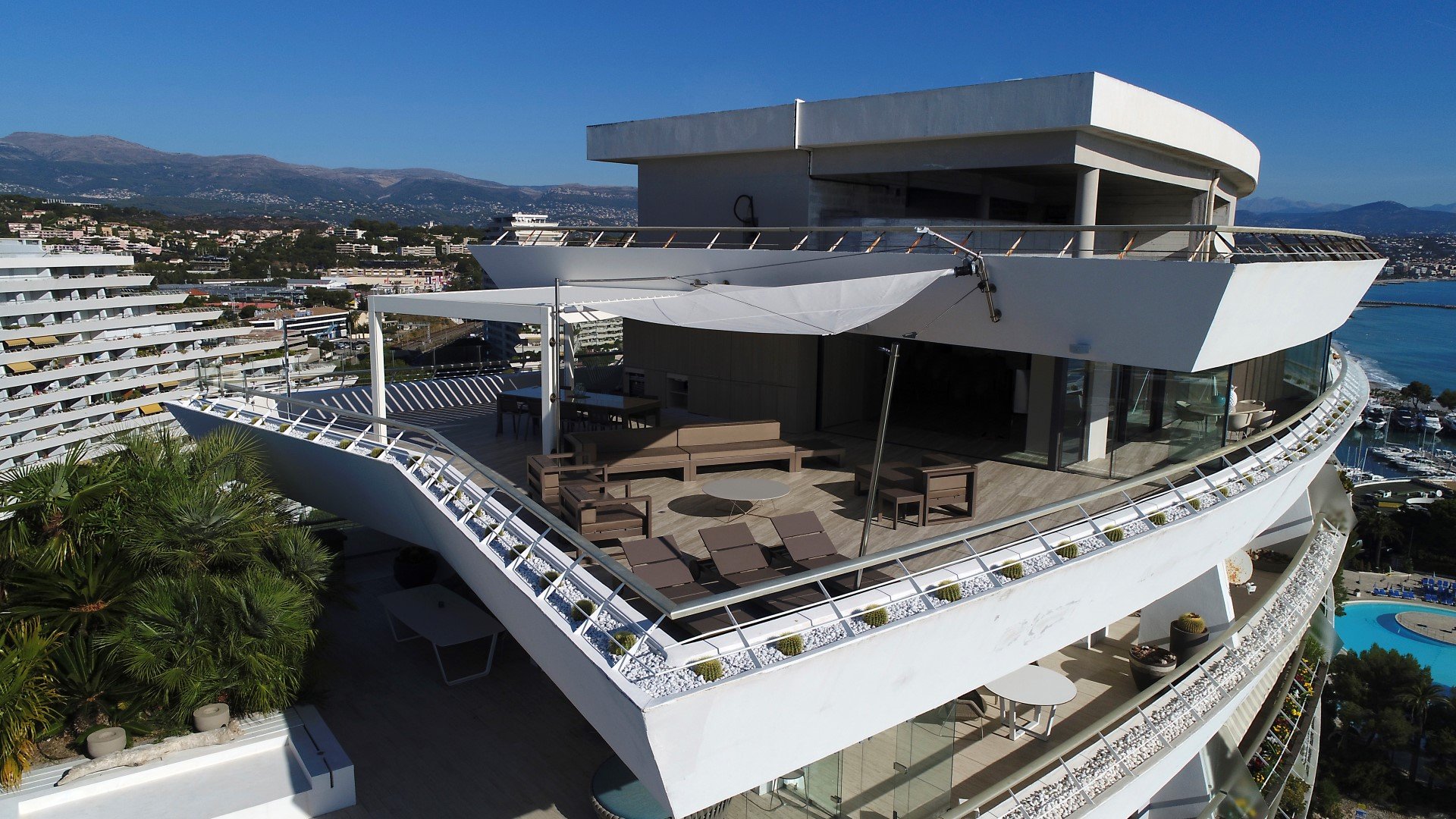 SunSquare triangular sail in Nice.