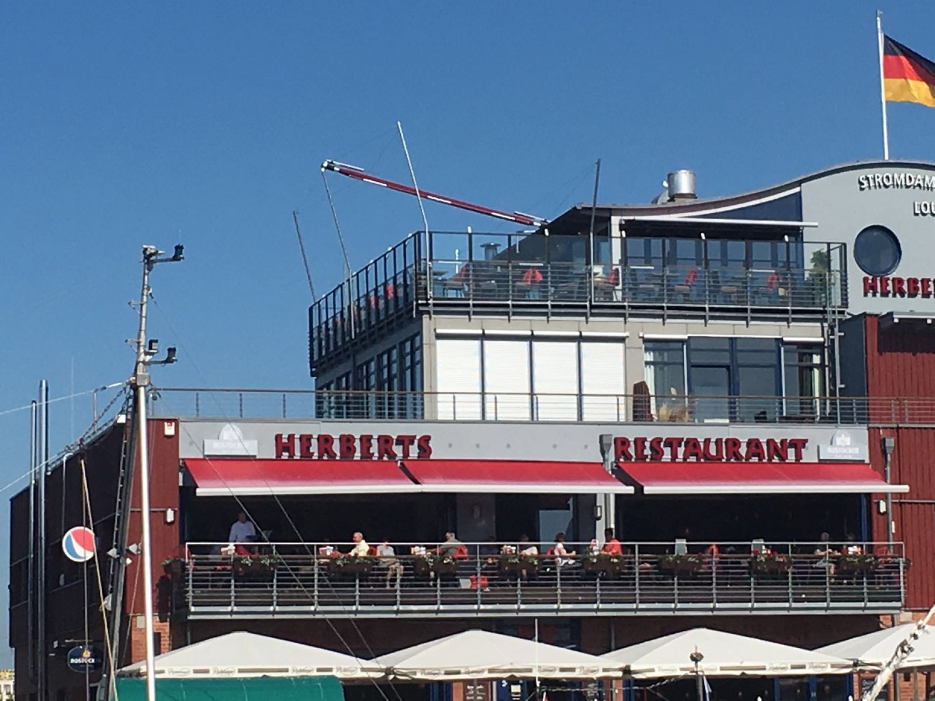 Herberts Warnemünde - Unter Segeln 54 Grad Nord - SunSquare